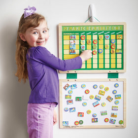Melissa & Doug deluxe dry-erase board showing seven-goal sections for weekly goals.