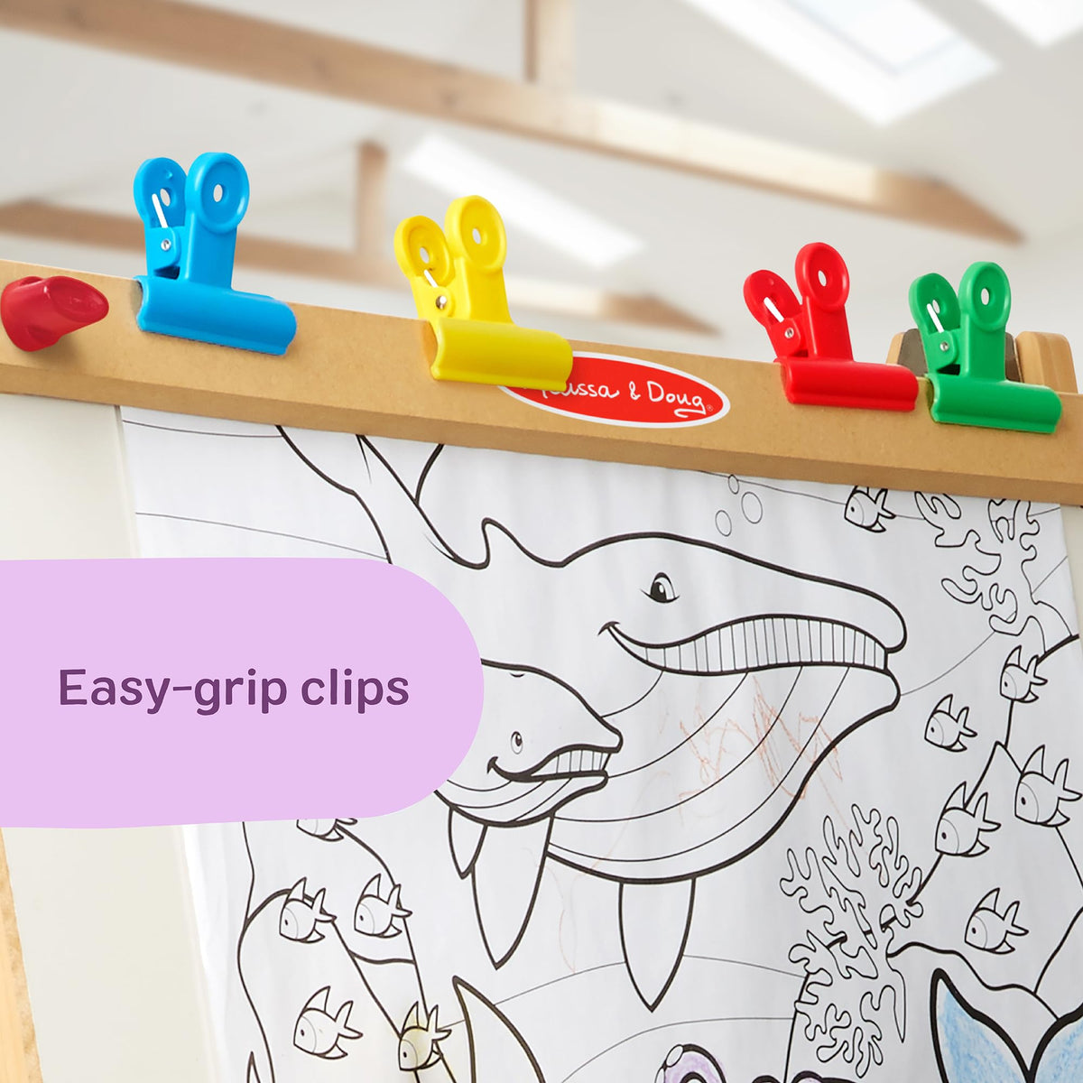 Melissa & Doug deluxe easel child-safe paper cutter for safe trimming.