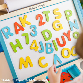 Melissa & Doug Deluxe Magnetic Letters and Numbers Set on fridge supports counting practice.