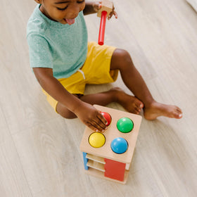 Melissa & Doug Pound & Roll Tower smoothed wood finish feels gentle to touch