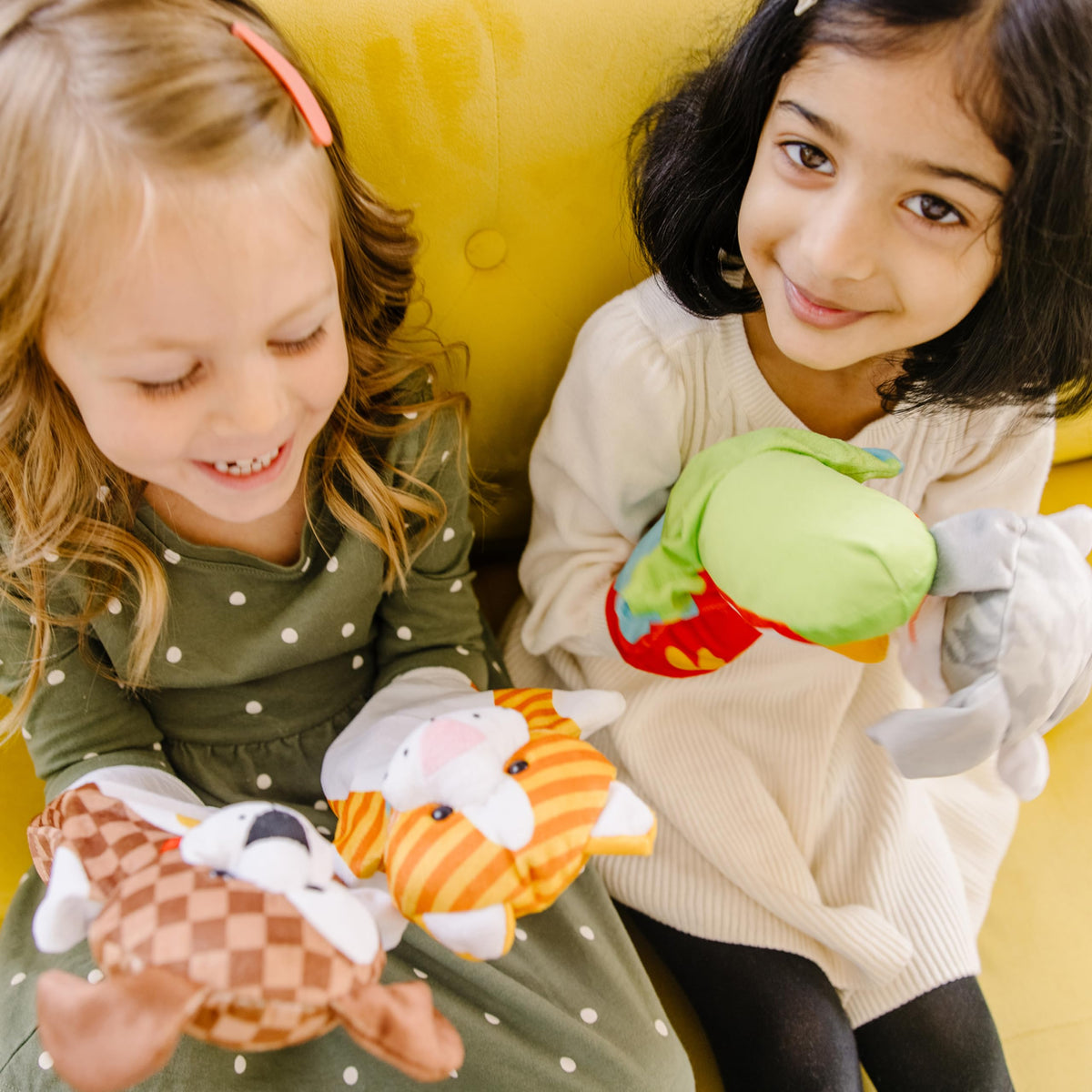 Melissa & Doug Deluxe Puppet Theater complements the hand puppets for screen-free storytelling.