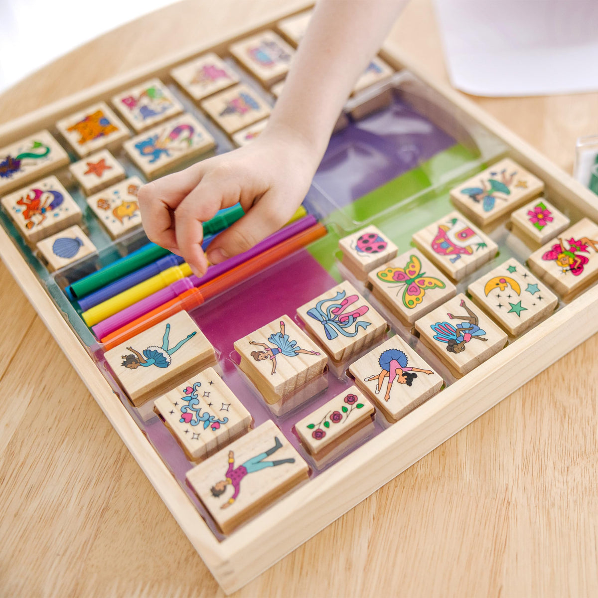 Melissa and Doug two-color ink pads in pink, purple, blue, and green for vibrant stamping.