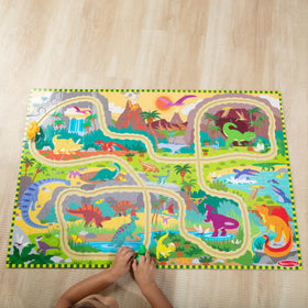 Melissa & Doug dinosaur adventure track scene with caves and waterfalls in action