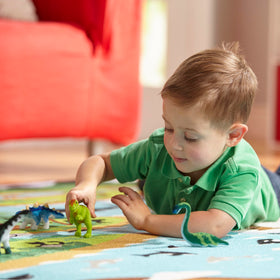 Melissa & Doug Pachycephalosaurus mini dinosaur with tactile felt surface.