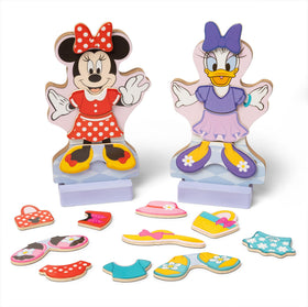 Melissa & Doug Minnie Mouse and Daisy Duck dress-up figures with magnetic outfits for pretend play.