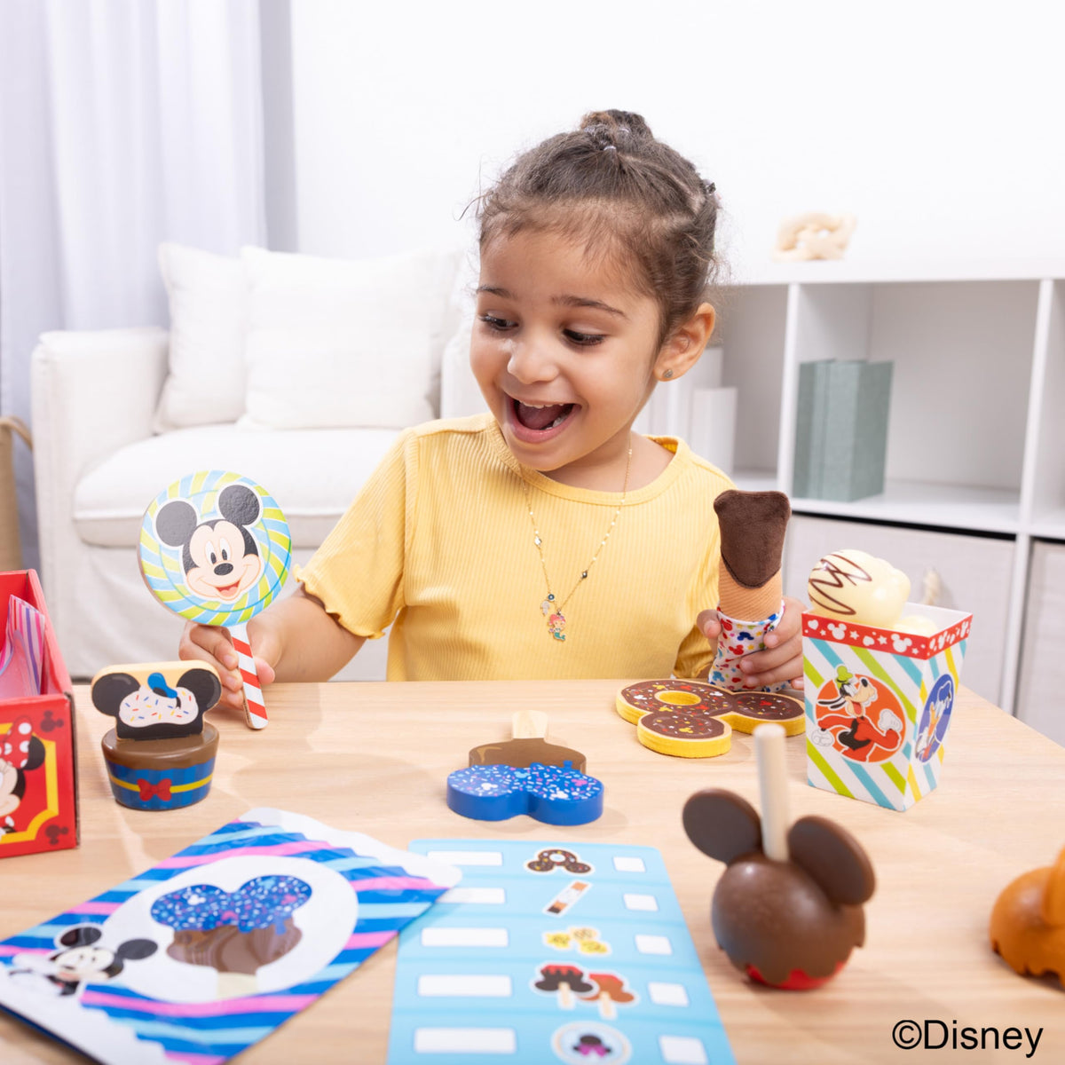 Melissa & Doug Disney wooden cupcake encourages sorting and imaginative dining.
