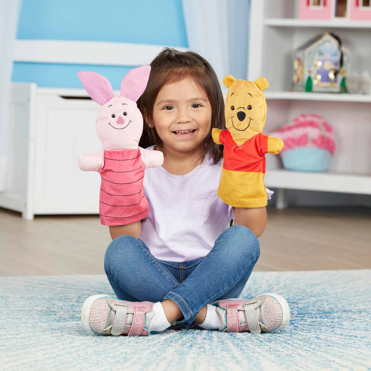 Tigger hand puppet from the Melissa & Doug Winnie the Pooh set adding energetic action