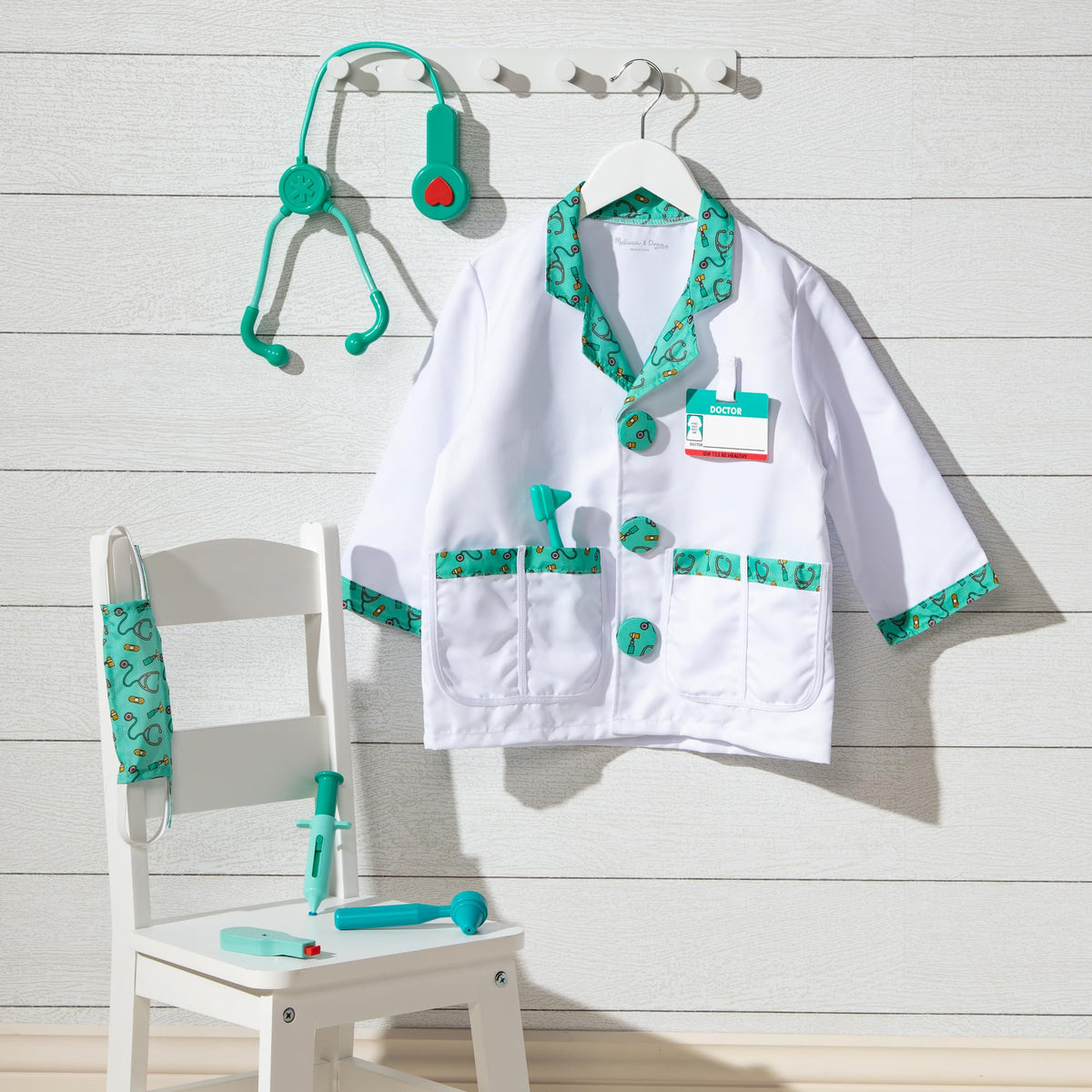 Melissa & Doug complete doctor costume ensemble for multi-piece dress-up.