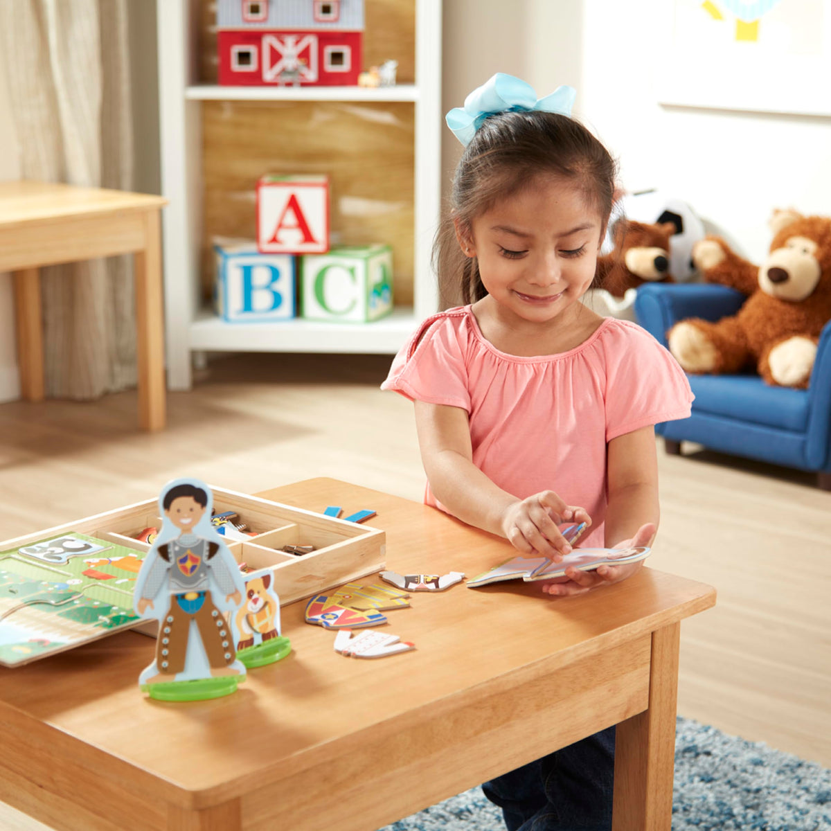 Melissa & Doug dogs accompany dress-up fun, boosting pretend play.