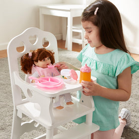 Melissa & Doug diaper bag for dolls keeps essentials organized during play.