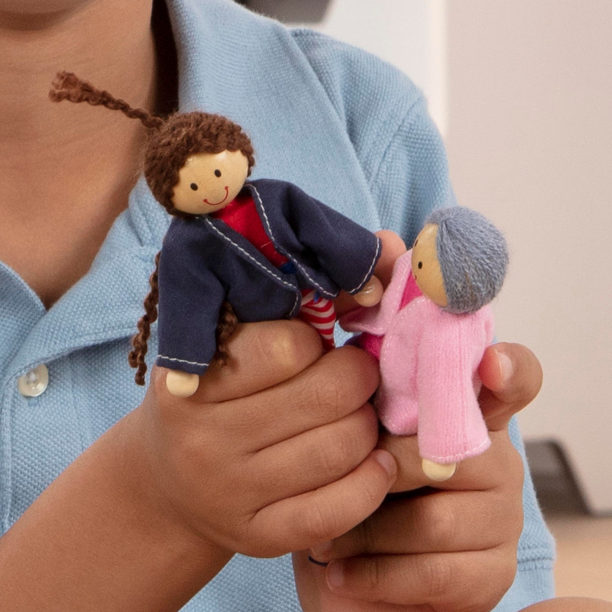 Melissa & Doug storage-case keeps dolls organized for quick cleanups.