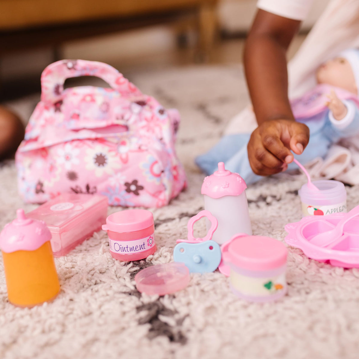 Spoon and spork set for feeding during pretend doll meals.