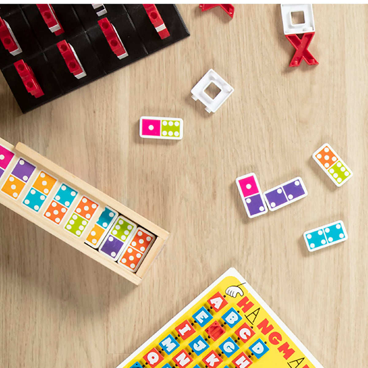 Melissa & Doug domino storage box showcased as a decorative display piece