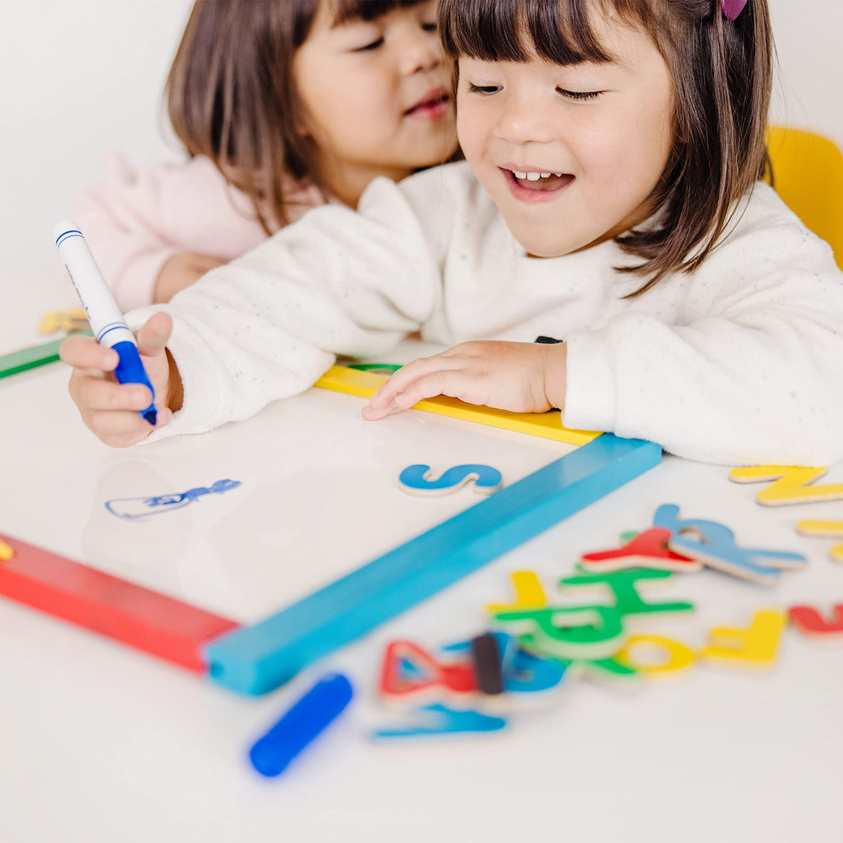 Melissa & Doug eraser and chalk provide mess-free cleanup after activities.