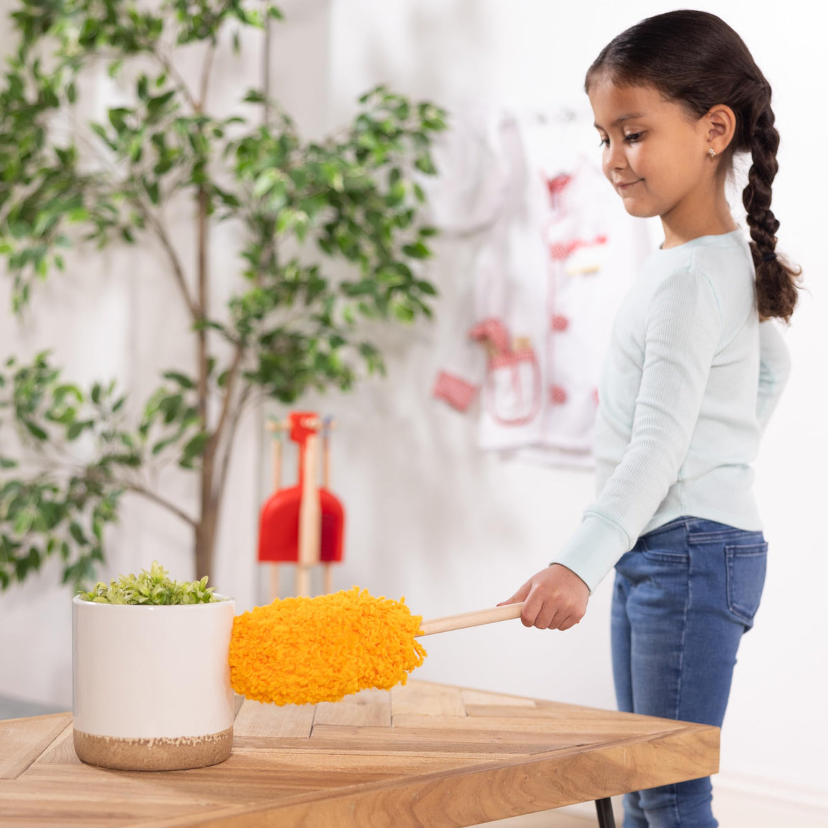 Melissa & Doug dust sweep mop duster invites imaginative tidying and fine motor practice.