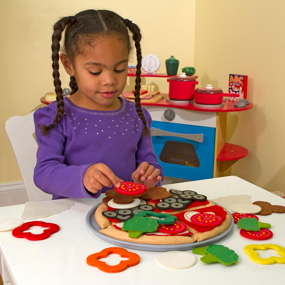 Melissa & Doug felt pizza slices kids can customize for creative storytelling