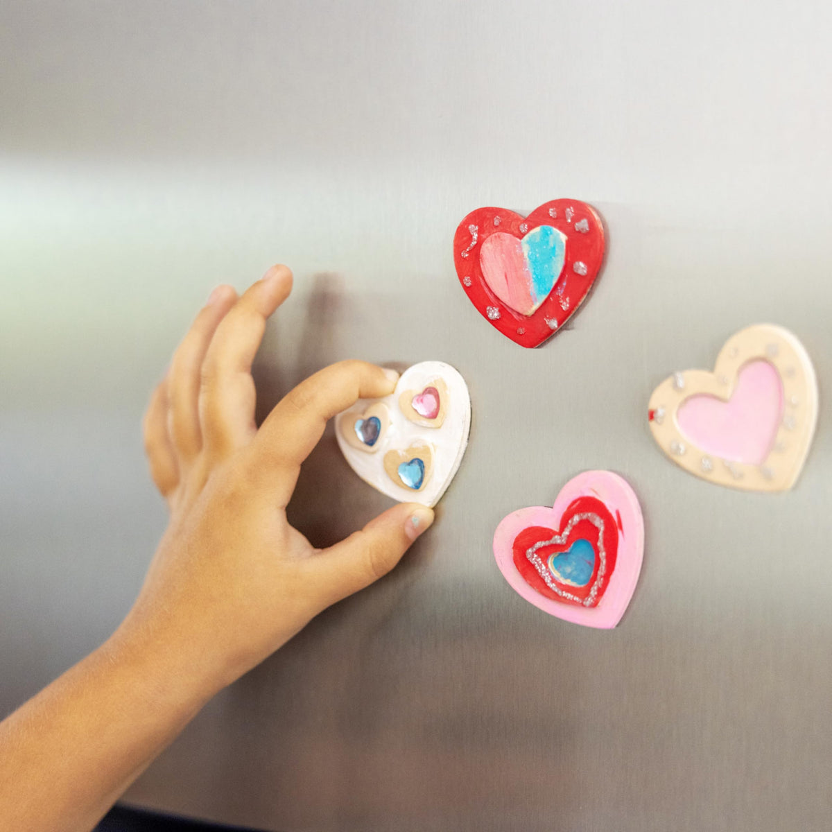 Melissa & Doug finished magnets on fridge showcase kid-made art