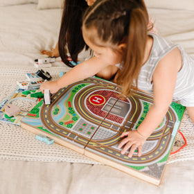 Melissa and Doug fire engine speeds along the town road system