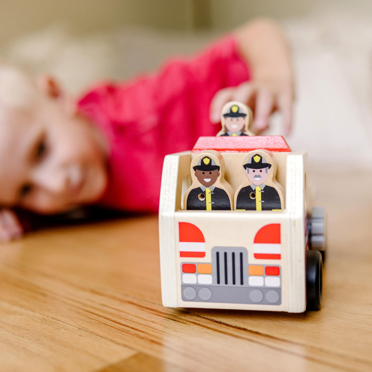 Smooth-rolling wheels help kids move the fire truck easily