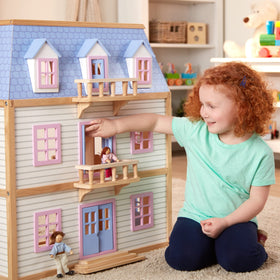 Five working exterior doors open for easy access during pretend play with Melissa & Doug.