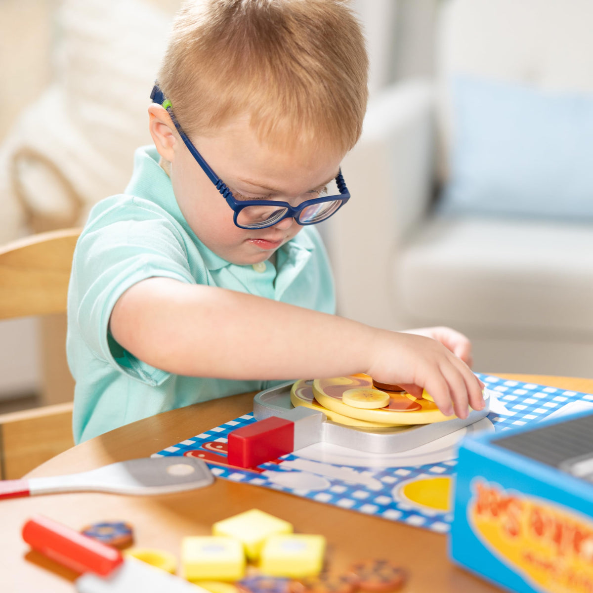 Melissa & Doug pancake butter pats and toppings for tactile breakfast play