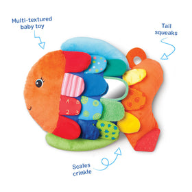 Hidden pictures under Flip Fish scales invite peek-a-boo moments