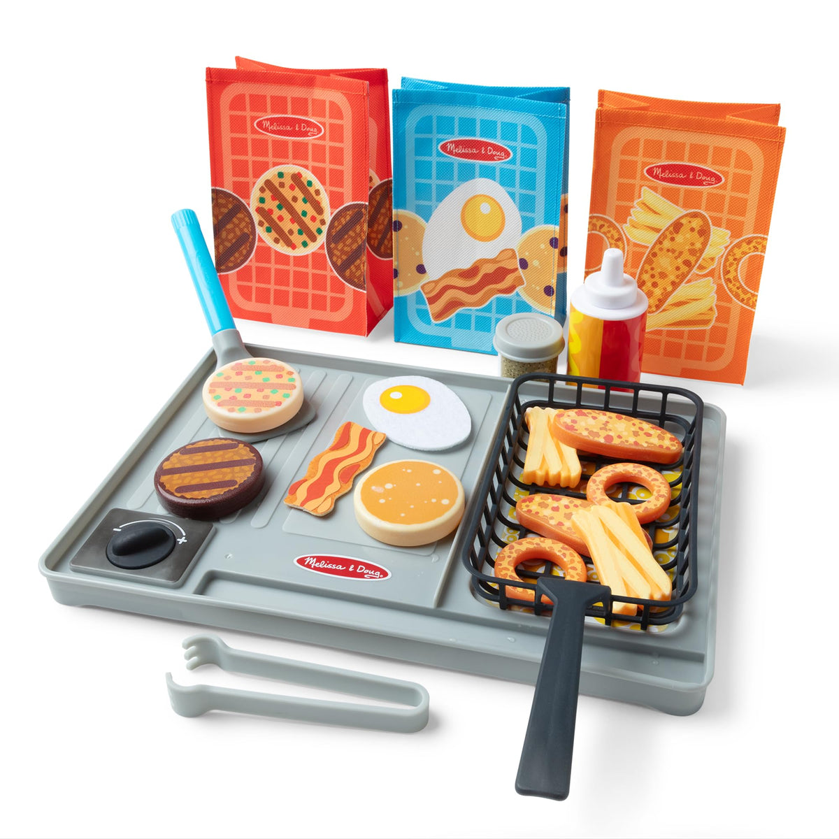 Melissa & Doug Flip & Fry Grill set on play surface for pretend grilling