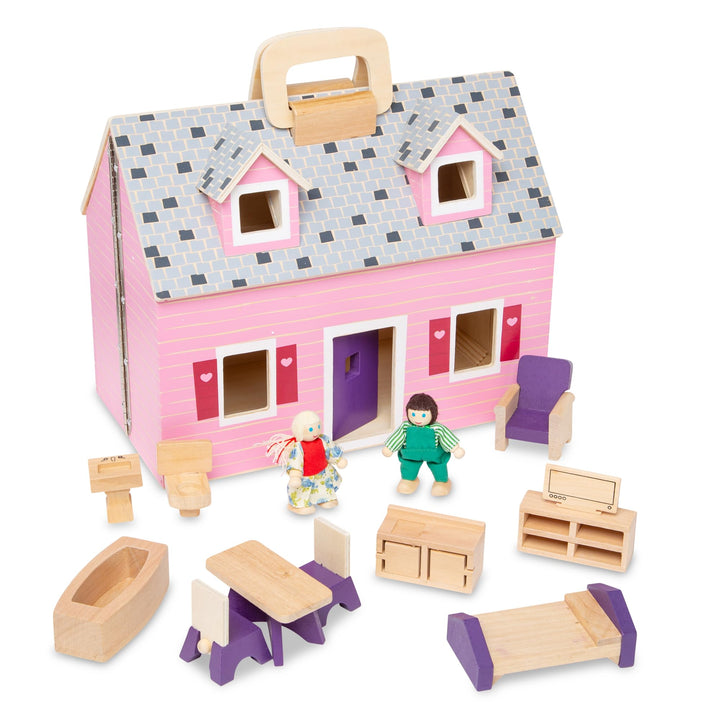 Melissa & Doug Fold & Go Dollhouse opened to four rooms for imaginative play on the go.