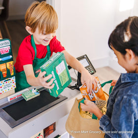 Melissa & Doug cloth shopping bag stores groceries during role-play.