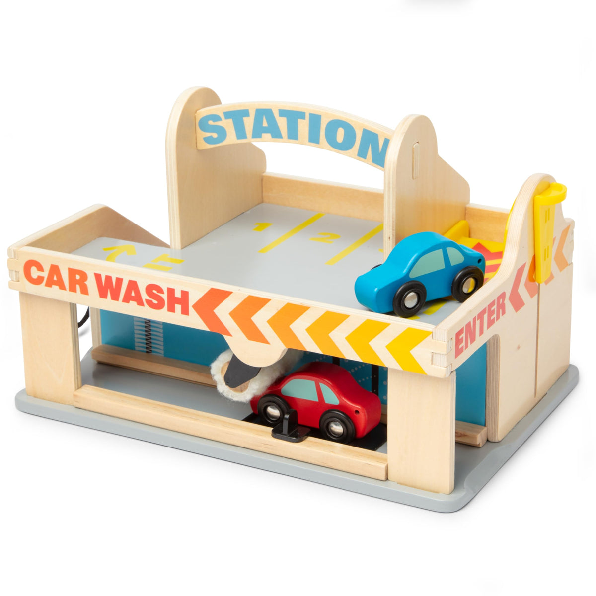 Gas pump hose fitting cars for quick fill-ups in Melissa & Doug set