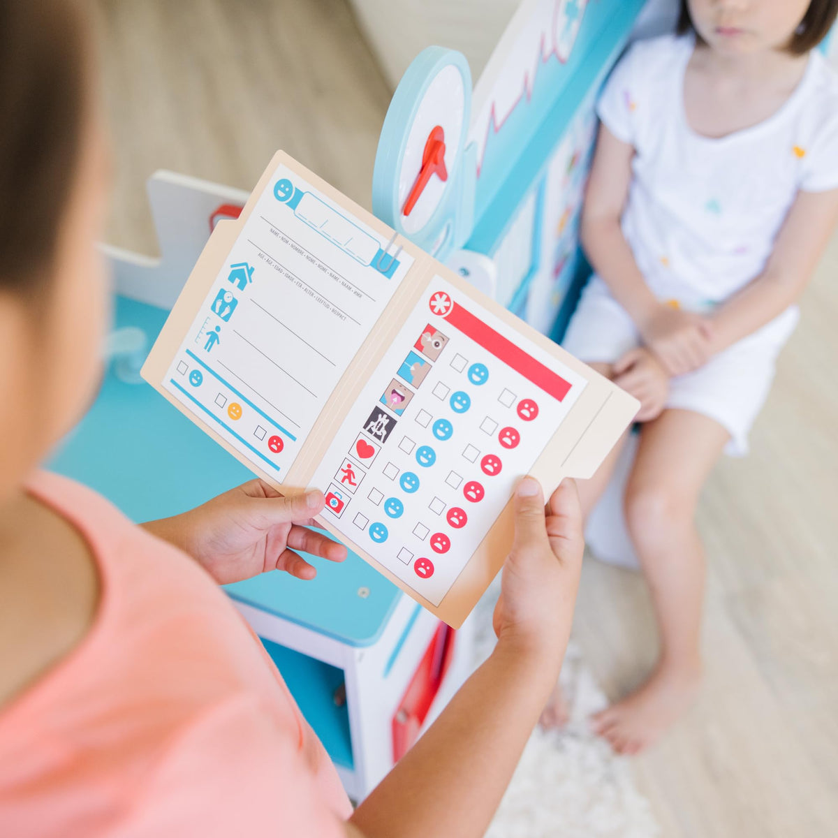 Melissa & Doug Get Well Doctor Center eye chart supports vision-testing play
