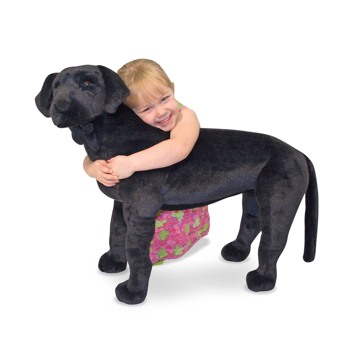 Side view of Melissa and Doug giant black lab plush to highlight pose