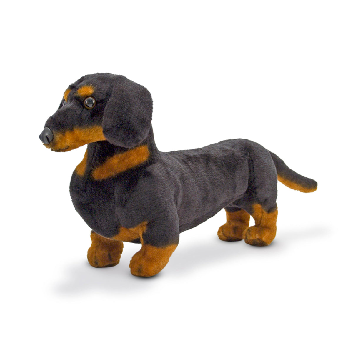 Melissa and Doug giant dachshund stuffed animal measures 16 by 11 by 6 inches.