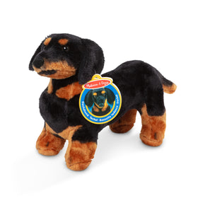 Melissa and Doug giant dachshund stuffed animal cuddly companion for bedtime and playtime.