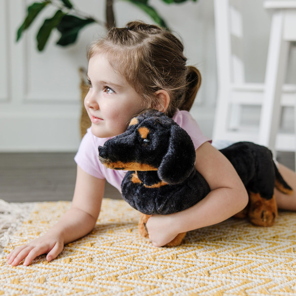 Melissa and Doug giant dachshund stuffed animal soft polyester fur inviting gentle cuddling.
