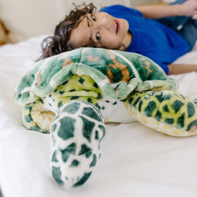 Age range 3 to 103 shown with Melissa & Doug Sea Turtle plush.