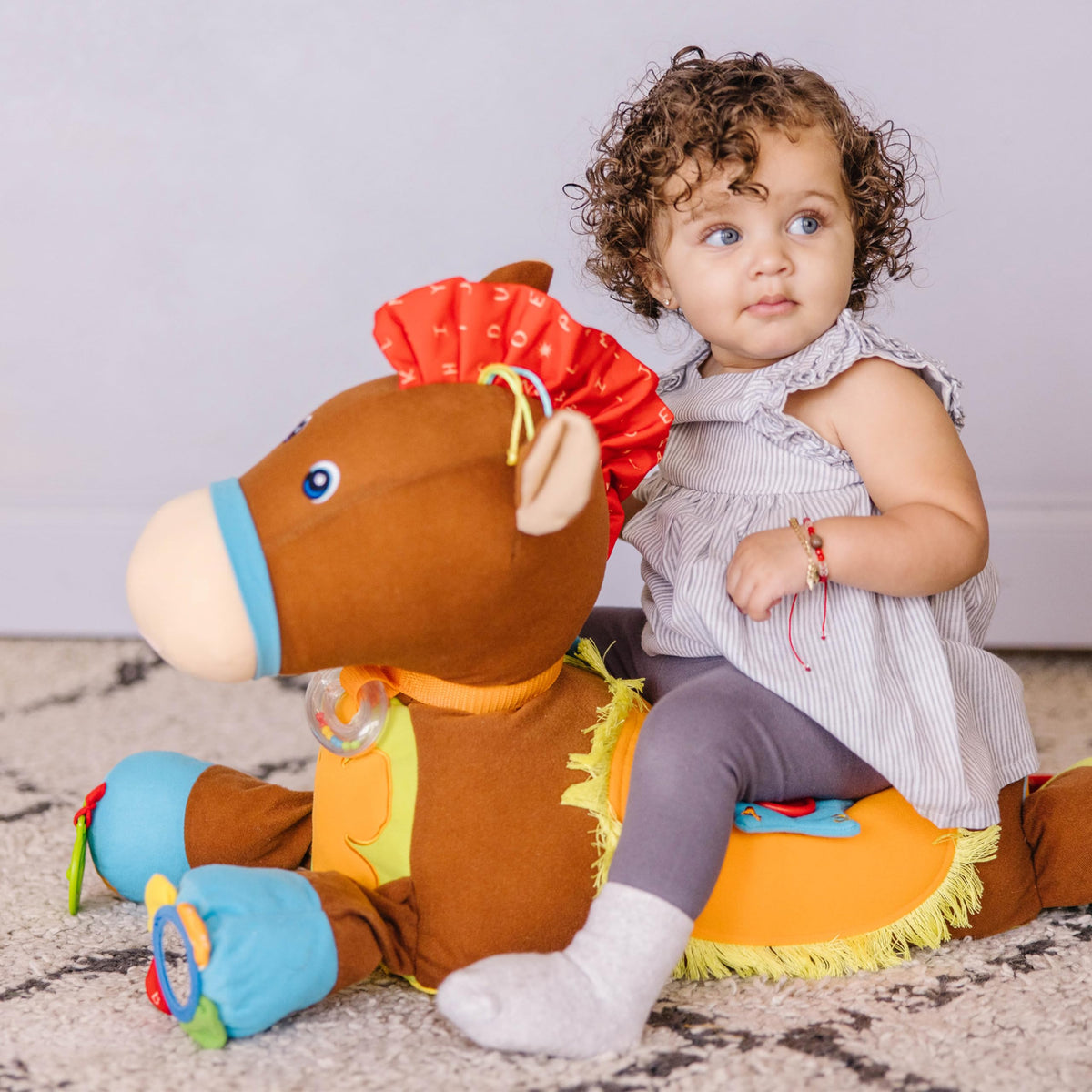 Melissa & Doug Giddy Up and Play mini mirror encourages facial recognition and social interest