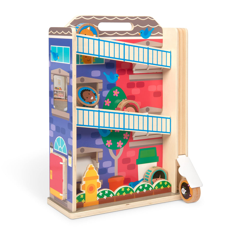 Melissa & Doug GO Tots town house disk tumble demonstrates motion-driven play for toddler exploration