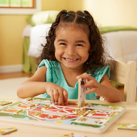 Melissa & Doug Hide and Seek Farm magnets behind doors for discovery and memory fun