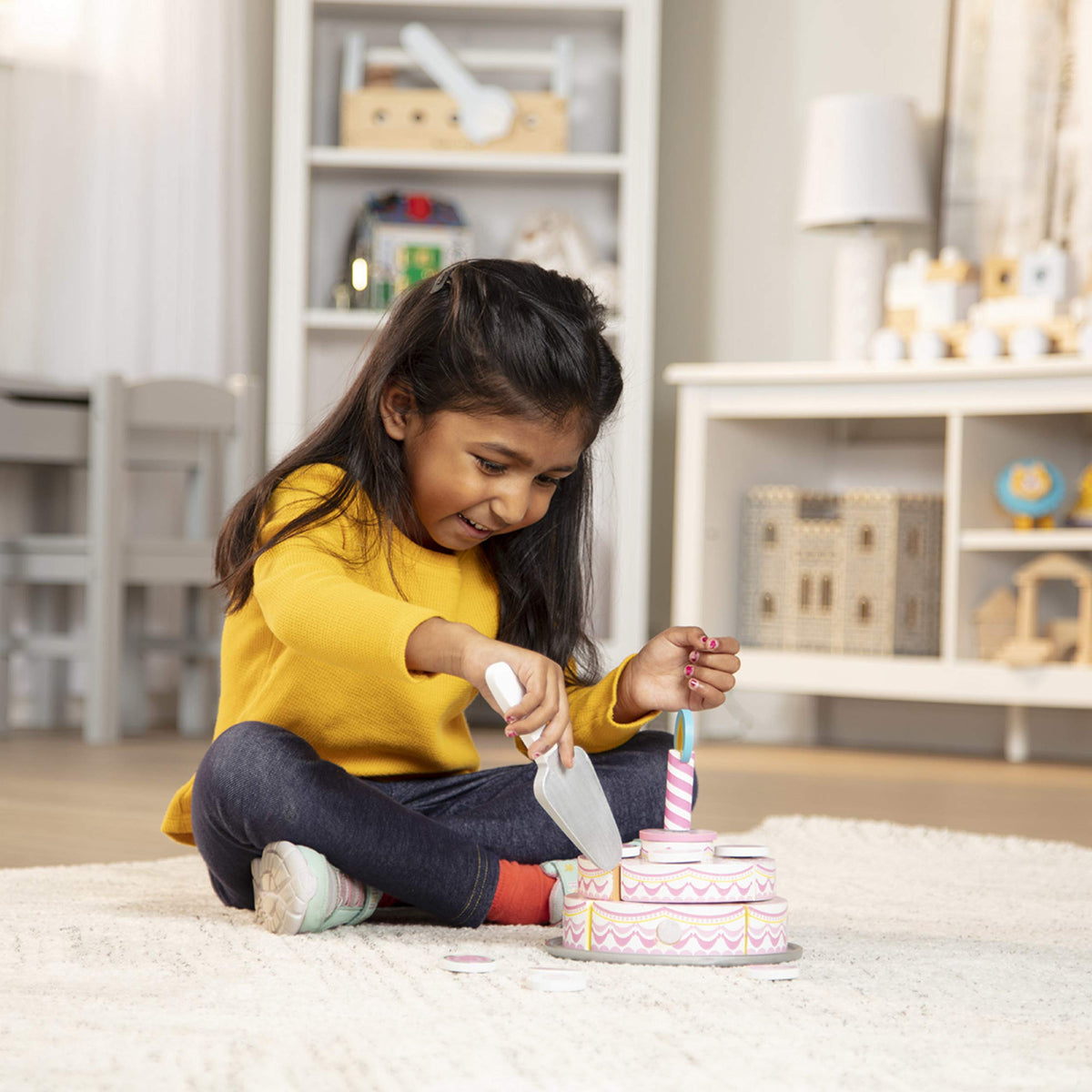 Colorful cake creates engaging storytelling and role-play scenarios.