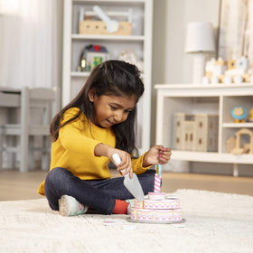 Colorful cake creates engaging storytelling and role-play scenarios.