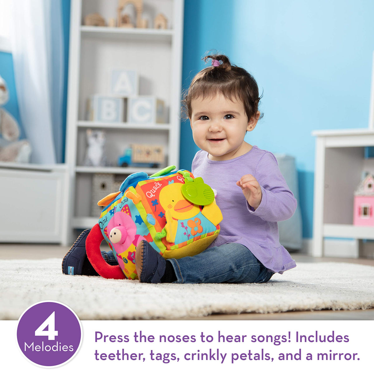 Melissa & Doug K's Kids Musical Farmyard Cube animal-songs when noses are pressed.