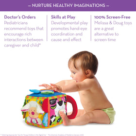 Melissa & Doug K's Kids Musical Farmyard Cube floor bump starts lively melodies.