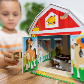 Four flocked animals—cow, pig, goat, and horse—for tactile pretend play