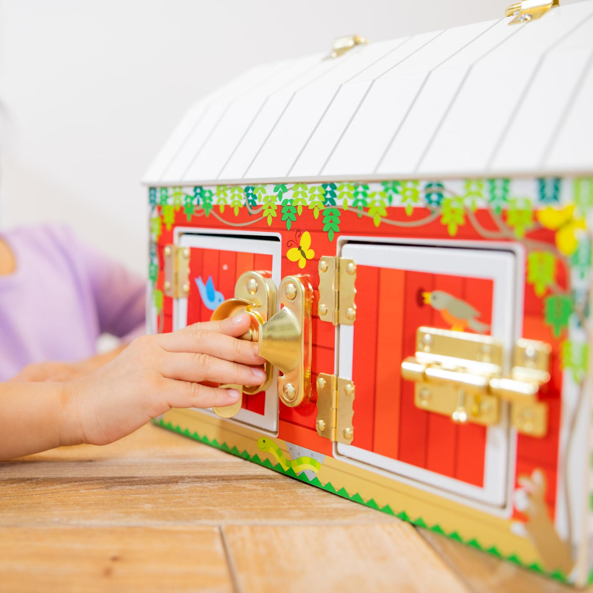 Brass handle on top for portable barn play and easy carrying