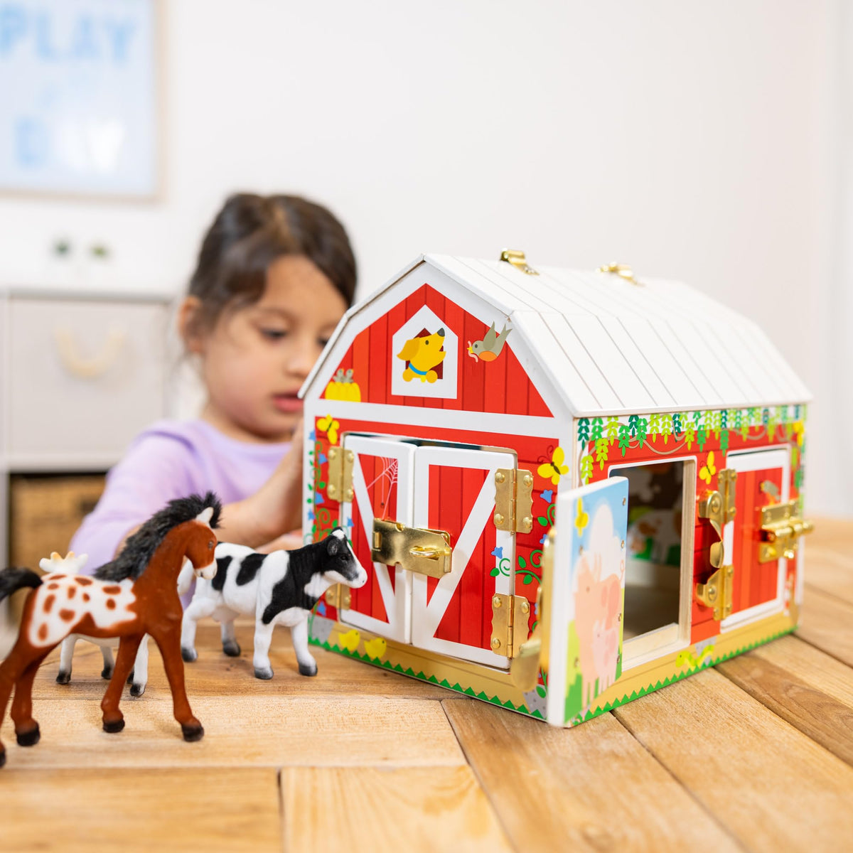 Melissa & Doug Latches Barn doors open and close with working locks to support fine motor skills