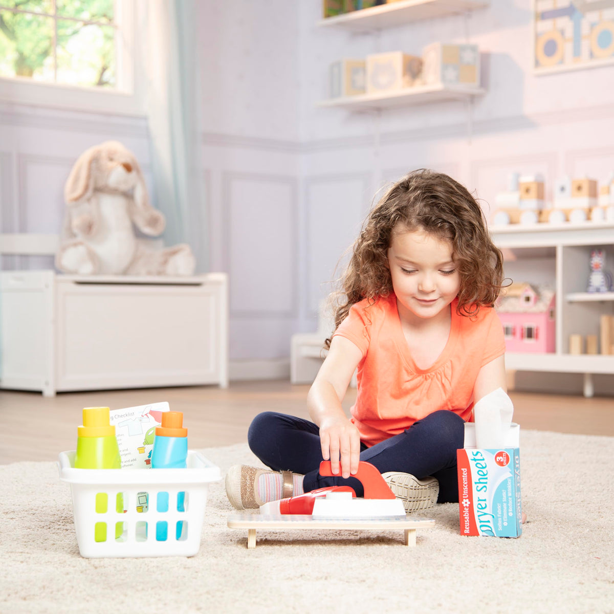 Melissa & Doug box of pretend dryer sheets adds playtime detail.