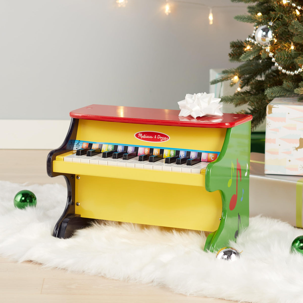 Melissa & Doug Learn-to-Play Piano's brightly colored keys spark curiosity and hands-on exploration.