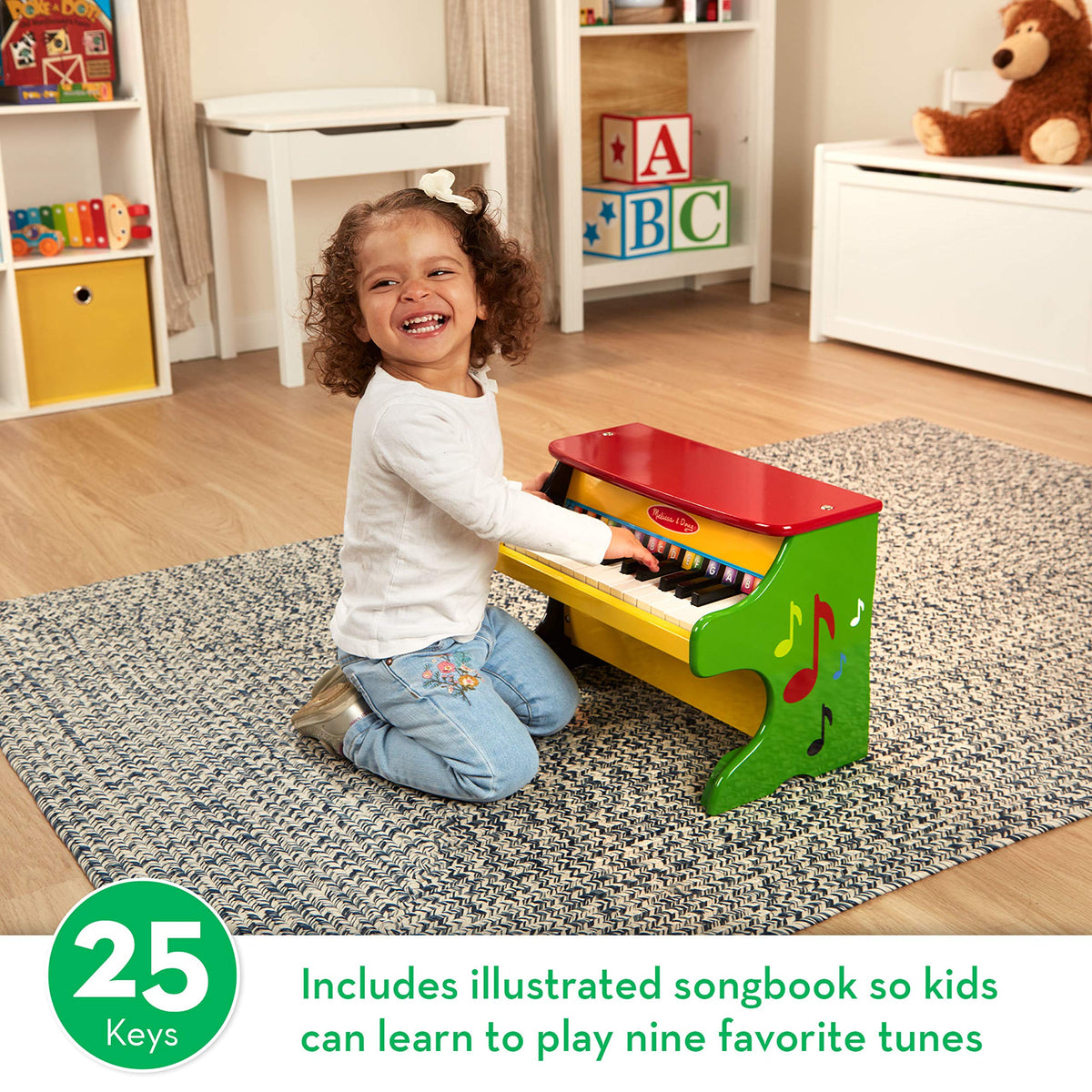 Melissa & Doug Learn-to-Play Piano color-coded songbook helps kids follow notes.