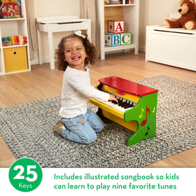 Melissa & Doug Learn-to-Play Piano color-coded songbook helps kids follow notes.